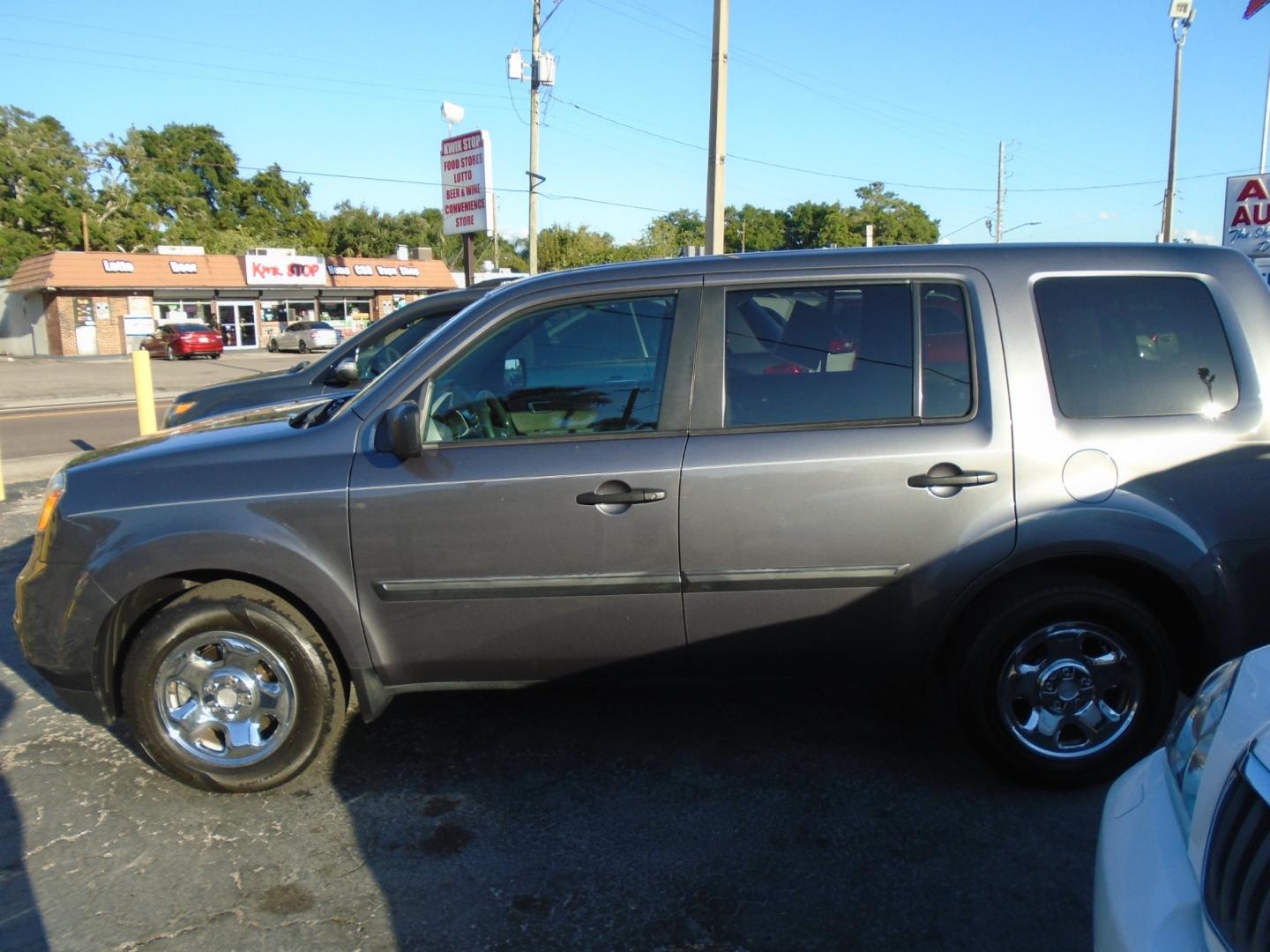 2014 Honda Pilot (5FNYF3H23EB) , located at 6112 N Florida Avenue, Tampa, FL, 33604, (888) 521-5131, 27.954929, -82.459534 - Photo#0